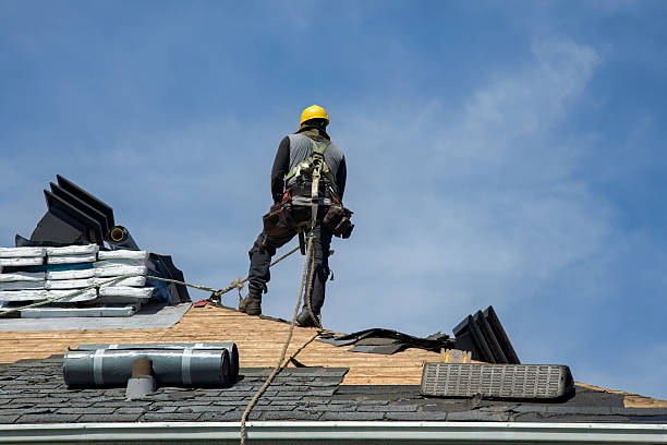 Professional Roofing technician working in Howells, NY